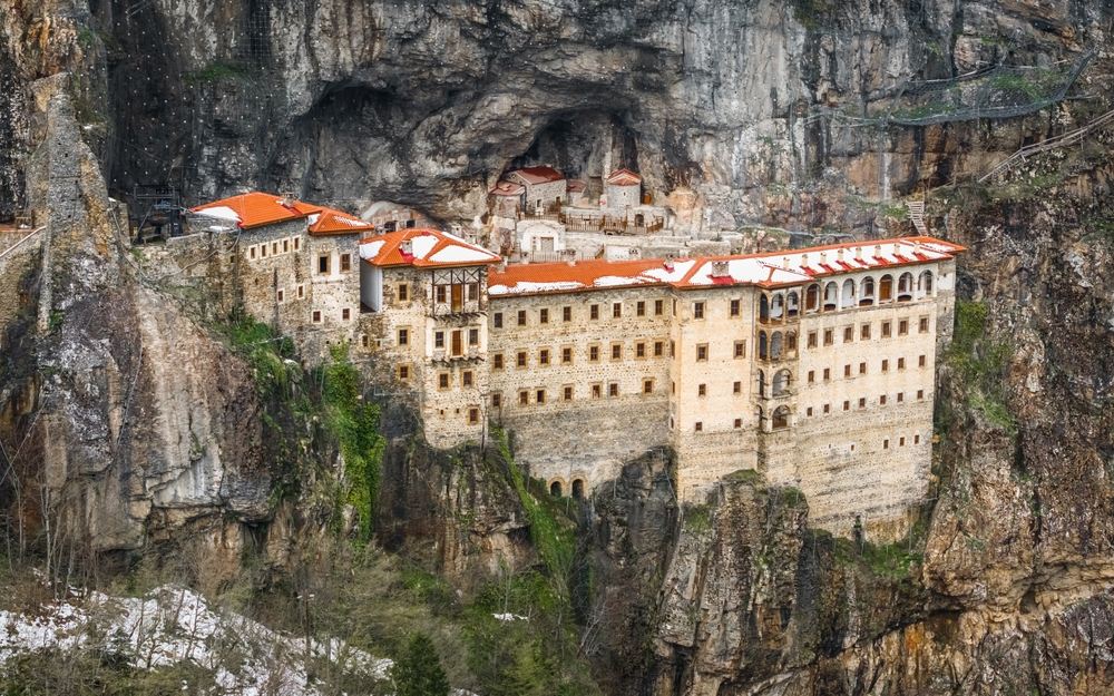 The stone aqueduct arches that once supplied water to Sümela Monastery